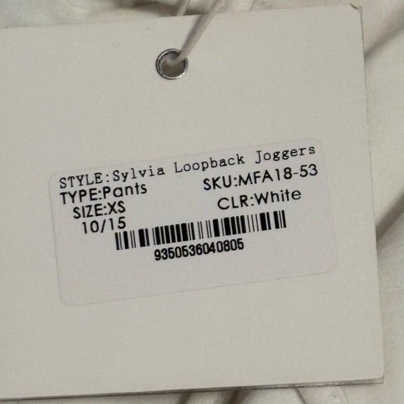 Meshki White High-Waisted Joggers with Tapered Cuffs - Picture 8 of 8